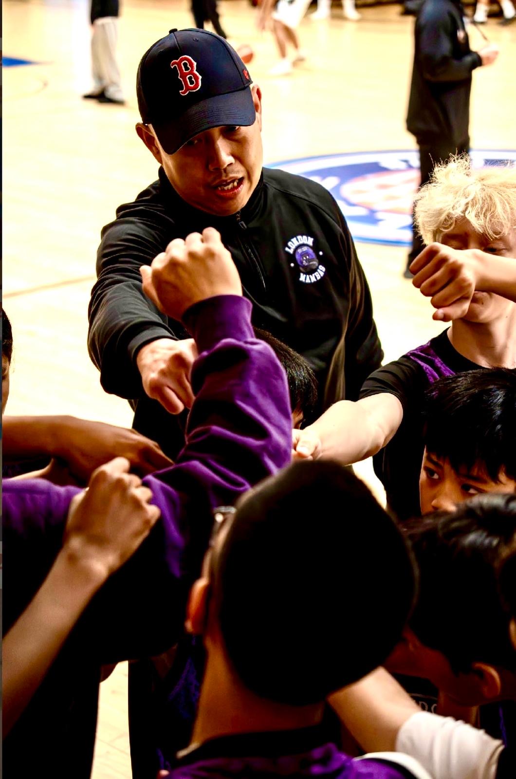 Coach Christopher Corpuz